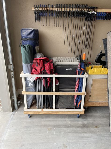 Camping Garage Storage, Garage Chair Storage, Summer Storage Ideas, Cushion Storage Garage, Cooler Storage Garage, How To Store Coolers In Garage, Doormat Storage, Garage Toy Storage Ideas, Camping Storage Garage