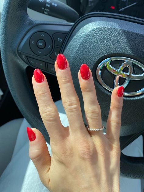 Round Red Nails Acrylic, Red Rounded Acrylic Nails, Red Nails February, Valentines Nails Gel Short Almond, Christmas Color Nails Acrylic, All Red Almond Nails, Short Rounded Red Nails, Christmas Red Nails Short, Simple Red Almond Nails