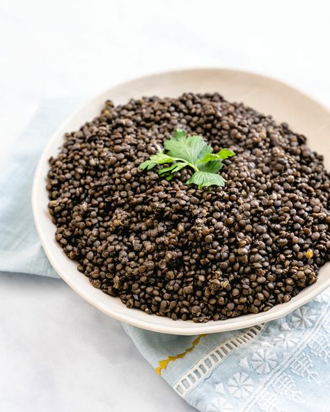 This seasoned black lentils recipe is a tasty way to cook lentils, simmered in broth with garlic and herbs. Serve them as a side or use in salads! #blacklentils #black #lentils #recipe Black Lentils Recipe, Black Lentil Recipes, Lentil Sandwich, Chickpeas And Rice, Lentil Tacos Recipes, Bean Protocol, Cook Lentils, Lentils Benefits, Lentil Recipes Healthy