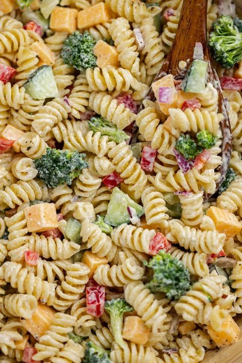 Get ready to dive into a bowl of our creamy ranch pasta salad. Packed with fresh vegetables and a tangy homemade dressing, it's a perfect dish for all your summer gatherings. Horseradish Pasta Salad, Few Ingredient Pasta Salad, Joanna Gaines Pasta Salad, Cold Ranch Pasta Salad, Quick And Easy Pasta Salad Recipes, Mayo Based Pasta Salad, Cheap Pasta Salad, Ranch Pasta Salad Recipes, Pasta Salad Recipes Vegetarian