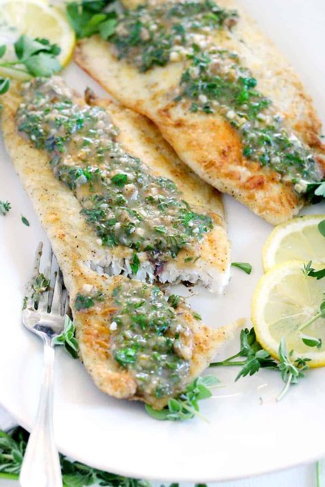 This pan fried sea bass with lemon garlic herb sauce is packed with flavor from fresh herbs. It's a delicious 20 minute Mediterranean recipe that's perfect for a busy weeknight! | www.bowlofdelicious.com #seabass #fishrecipes Striped Bass Recipe, Garlic Herb Sauce, Mediterranean Recipe, Sea Bass Recipes, Herb Dressing, Herb Sauce, 20 Minute Recipes, Lemon Herb, Garlic Herb