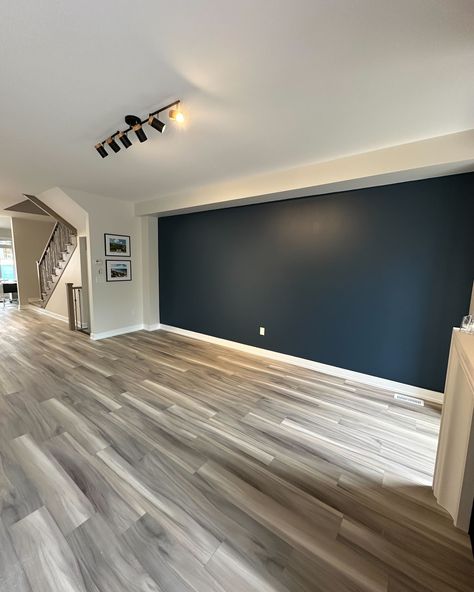 Finalizing our new sales office/model home in The Blue Mountains, On! 🏘 . Contact @cvdgroup for more info: info@cvdgroup.ca . #homebuilding #townhomes #housesales #newhomesales Accent Wall For Grey Living Room, Blue Basement, Blue Accent Wall, Grey Living Room, Gray Floor, Blue Accent Walls, Sales Office, Blue Accent, Model Home