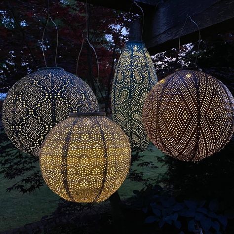 The globe ikat lantern with it's shimmery copper is made of durable Tyvek™ material that is weatherproof, colorfast and tough enough to be left hanging outside! Pairs well with other hanging lanterns. SPECIFICATIONS Dimensions: 11.8" x 11.8" x 7.4"Finish: CopperMaterial: Weather-resistant and 100% recyclable TyvekContains: Come with 2 AAA batteries and remote control with battery. Remote has dimmer and 4 timers.Ships: Ground Delivery, Shipping is included in the price.(No handling fee on orders Patio Lanterns, Tree Lanterns, Solar Powered Lanterns, Blue Lantern, Japanese Lanterns, Iron Accents, Lantern Chandelier, Outdoor Hanging Lanterns, Garden Lanterns