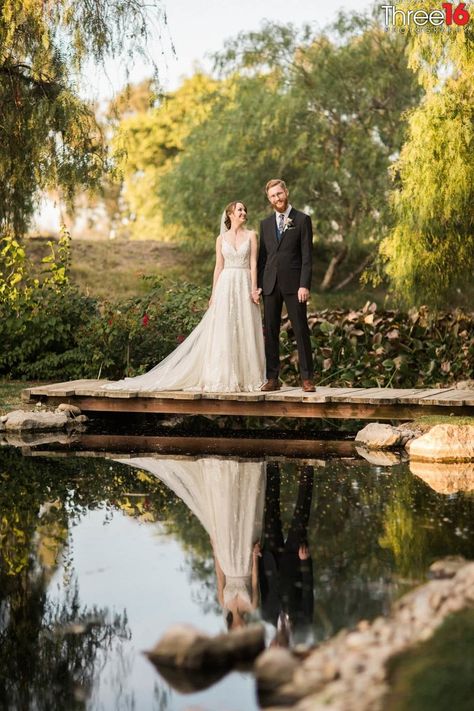 Galway Downs by Wedgewood Weddings is a San Diego-area all-inclusive wedding venue located in Temecula, California | bride + groom overlooking pond Wedding By A Pond, Galway Downs Wedding, Pond Wedding Ideas, Wedding By Pond, Pond Wedding Ceremony, Pond Wedding Photos, Lake Wedding Pictures, Newfoundland Wedding, Wedding Landscape