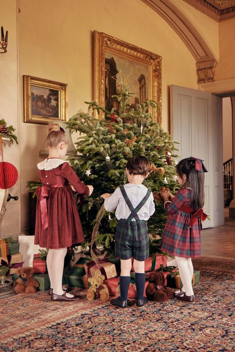 Explore heritage tartans, timeless winter checks, and beautiful Fair Isle knits. Our Christmas collection pays homage to the rich British traditions and iconic styles of centuries past, curating a timeless aesthetic. Don't miss out; shop the collection both in-store and online at pepalondon.com #pepalondon #traditionalchildrenswear #AW23 British Christmas Aesthetic, Rich Christmas Aesthetic, British Heritage Fashion, Noel Illustration, Zara Home Christmas, Highland Fling, British Christmas, Baby Cinderella, Christmas Portrait