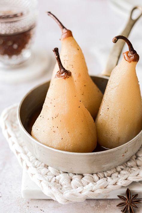 Poached pears are easy to make by simmering them in spiced syrup, and delicious for breakfast or dessert! Pear Desserts, Dark Food, High Altitude Baking, Pear Dessert, Baked Pears, Dark Food Photography, Shake N Bake, Poached Pears, Pear Recipes