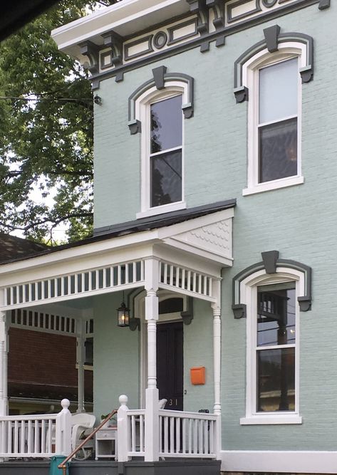 Mint green exterior of two story house with white porch Mint Color House Exterior, Light Teal Exterior House Paint, Colourful Home Exterior, Mint Exterior House Colors, Pale Green House Exterior, Mint Green House Exterior Color Schemes, Mint House Exterior, Mint Green Exterior House Colors, Blue Green House Exterior