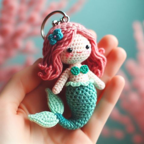 Explore the enchanting detail of this crochet mermaid keychain, featuring a teal tail and rose-pink hair. A perfect blend of charm and craftsmanship. Crochet Mermaid Dress Pattern, Mermaid Crochet Pattern Free, Crochet Reference, Little Mermaid Crochet, Mermaid Keychain, Mermaid Tail Pattern, Mermaid Crochet Pattern, Crochet Parrot, Crochet Cluster Stitch