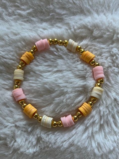 Polymer Clay Bracelet Ideas Summer, Cute Pink Clay Bead Bracelets, Orange And Pink Clay Bead Bracelet, Bracket Clay Beads, Clay Bead Bracelet Small Business, Light Pink Clay Bead Bracelet, Diy Clay Bead Bracelet Ideas, Braclets Ideas Beaded Clay Beads, Orange Clay Bead Bracelets