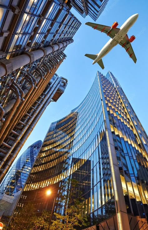 Premium Photo | A jet plane flying over the city Plane Wallpaper, Plane Photography, Plane Flying, New York Wallpaper, Airplane Wallpaper, Airplane Photography, Dubai Tour, Fotografi Kota, Plane Travel