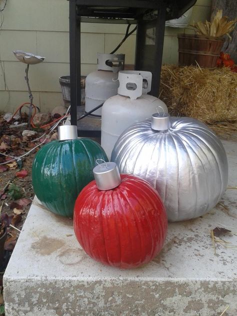 Reused my halloween pumpkins for Christmas. Just spray paint, a spray paint lid for the ornament topper and some wire Pumpkins Painted Like Christmas Ornaments, Reuse Pumpkins For Christmas, Pumpkin Christmas Ornaments, Pumpkins Decorated For Christmas, Turning Pumpkins Into Christmas Decor, Turn Pumpkins Into Christmas Decor, Painting Pumpkins For Christmas, Painted Pumpkins For Christmas, Painted Pumpkins Christmas