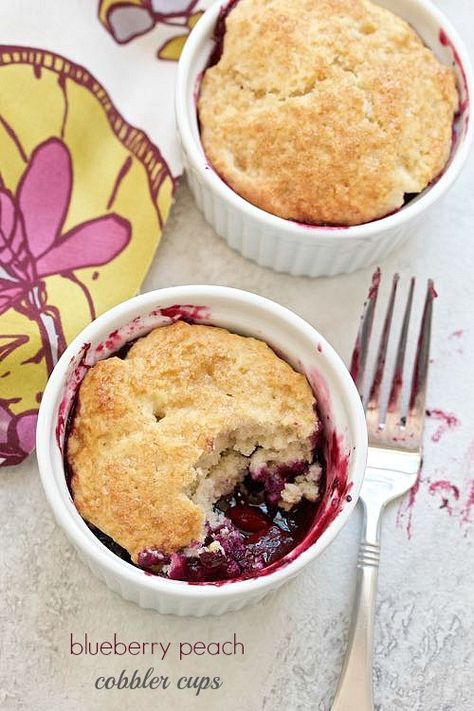 Cute & easy cobbler cups, featuring juicy blueberries & peaches… Peach Cobbler Cups, Cobbler Cups, Blueberry Peach Cobbler, Easy Cobbler, Peach Blueberry Cobbler, Easy Blueberry Cobbler, Winter Smoothies, Biscuit Crust, Coconut Pecan Frosting