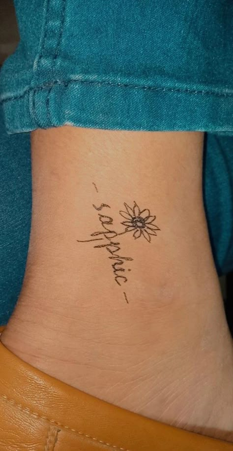 sunflower tattoo with gay propaganda Lesbian Small Tattoo Ideas, Tattoo Ideas Lesbian Couple, Lesbian Minimalist Tattoo, Small Lesbian Tattoos, Discreet Lesbian Tattoo, Lesbian Flag Tattoo, Saphicc Tattoo, Sapphic Tattoo Minimalist, Bi Tattoos For Women