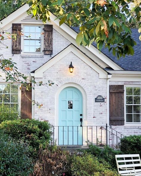 White washed brick brown shutters blue door exterior home makeover Brown Shutters, White Brick House, Exterior Home Makeover, Green Front Doors, White Wash Brick, White Brick, Blue Door, Home Exteriors, Exterior House Colors