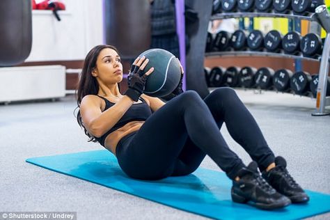 Medicine balls sit ups are a more advanced version of the crunch and require a lot of balance (stock image) Med Ball Exercises, Weighted Ball Workout, Weighted Ball Exercises, Medicine Ball Exercises, Ball Workouts, Best Core Workouts, Medicine Ball Workout, Ball Workout, Weight Ball