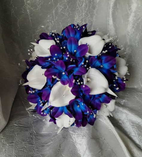 This beautiful bouquet is made with purple blue velvety soft galaxy orchids, real touch calla lilies, royal hydrangeas and accented with pearl stems and rhinestones. Bouquet handle is wrapped with rhinestone mesh. Small Bridal Bouquet, Galaxy Orchid, Purple Turquoise Wedding, Blue Orchid Wedding, Blue Bridal Bouquet, Blue Purple Wedding, Small Bridal Bouquets, Bridal Wedding Flowers, Turquoise Bridesmaid