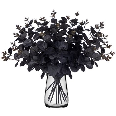 PRICES MAY VARY. The halloween decorations come in 14pcs black eucalyptus stems artificial flowers,perfect for adding a festival atmosphere to your Halloween party. Note: Vase is not included.During the long time of transportation,stems may be slightly deformed.But rest assured, it will not affect their use or overall appearance.You just need to adjust them a little bit with your hands. The eucalyptus leaves are made of silk, providing a realistic look and feel.Each stem has a length of approxim Black Halloween Decor, Black Eucalyptus, Porche Halloween, Festival Atmosphere, Eucalyptus Stems, Casa Halloween, Modern Halloween, Halloween Porch Decorations, Artificial Leaf