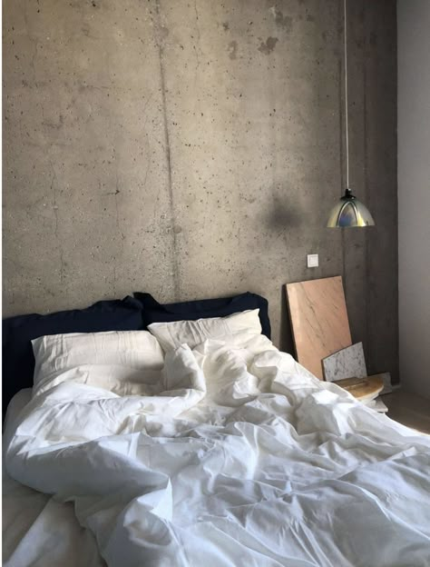 Raw Concrete Wall, Industrial Minimalist Bedroom, Brutalist Interior, Functional Bedroom, Navy Blue Pillows, Industrial Minimalist, Dream House Interior, Apartment Inspiration, Room Inspiration Bedroom