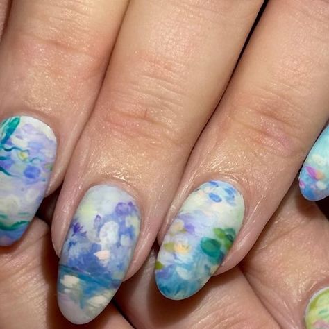 colette gallant on Instagram: "waterlillies monet inspired. the ultimate spring nails for real for real this color palette is absolutely divine. painted pretty much this whole set with @nailz_by_dev 5mm dream liner.   i find oil paint texture really hard to replicate with gel but i’ve found loading up your brush and then mushing it all out does the job lol. very technical around here 🫡  using @ericasata cuticle bits, implements and luminary base  and @nailz_by_dev @nailzbydevshop   white out gel polish pastel gel liners 9mm dream liner brush  5mm dream liner slim shady brush   matte top coat   shop @ericasata using code ✨ pbc10 ✨ to save  shop @nailzbydevshop using code ✨ pbc10 ✨ to save" Oil Paint Texture, Monet Inspired, Paint Texture, Matte Top Coat, Liner Brush, Pastel Palette, Slim Shady, Pastel Nails, Gel Liner