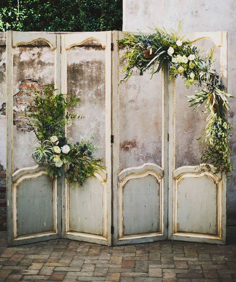 vintage screen ceremony backdrop decorated with airplants and blooms Vintage Backdrop, Outdoor Country Wedding, Deco Champetre, Wedding Ceremony Ideas, Wedding Furniture, Wedding Altars, Wedding Ceremony Backdrop, New Orleans Wedding, Ceremony Backdrop