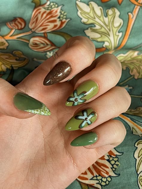 Simple Earthy Nails, Green Cottagecore Nails, Sage Green Star Nails, Green And Beige Nails, Muted Green Nails, Hozier Inspired Nails, Fairy Green Nails, Purple And Green Nails Design, Green Star Nails