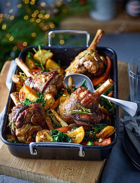 This aromatic, slow-cook lamb shanks recipe, served on a bed of roasted root vegetables, is an effortless meal to enjoy over the Christmas period. It takes just 15 minutes of prep before going in the oven, so you can enjoy time with guests Fall Lamb Recipes, Christmas Lamb Recipes, Lamb Shank Recipe Oven, Roasted Meat Recipes, Christmas Feast Dinner, Vegetables Platter, Gourmet Food Recipes, Best Grilled Vegetables, Shanks Recipe