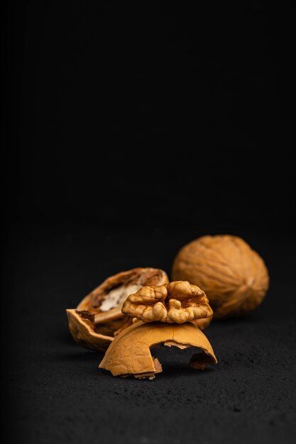 Walnut on a dark background | Premium Photo #Freepik #photo #walnut #dried-fruit #black-seed #nuts Walnuts Photography, Walnut Photography, Health Benefits Of Walnuts, Nutter Butter Cookies, Nutter Butter, Food Ad, Nut Recipes, Food Ads, Black Seed