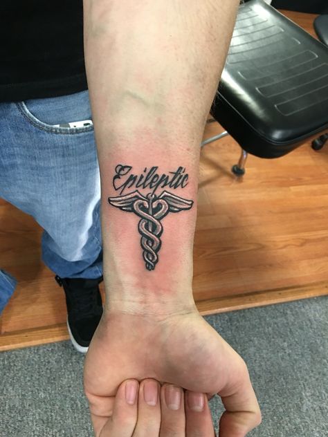 Epileptic tattoo Medical Allergy Tattoo Ideas, Medic Tattoo Ideas, Epilpsey Tattoo, Rare Disease Tattoo, Epileptic Tattoos, Epileptic Tattoo Ideas, Medical Alert Tattoo, Faith Tattoo Designs, Mum Tattoo