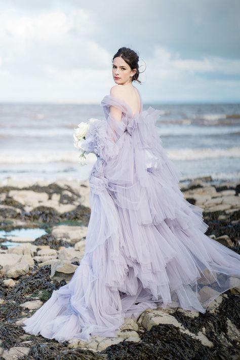 Sally Bean pale lilac / purple wedding dress with tulle layers + oversized bow. Sara Cooper Photography #sallybean #purpleweddingdress #lilacweddingdress #oversizedbow #colouredweddingdress Lilac Tulle Dress, Wedding Dress Tiered, Lilac Wedding Dress, Lavender Wedding Dress, Couture Editorial, Purple Wedding Dresses, Asymmetrical Gown, Ethereal Gowns, Violet Wedding