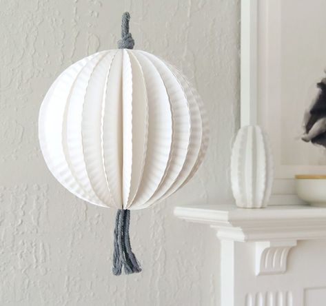 This paper plate hanging decor beautifies your home on a budget Diy Paper Lanterns Hanging, Paper Lanterns Diy Hanging, Diy Paper Lanterns, Flying Lantern, Lanterns Hanging, Paper Lanterns Diy, Old Glass Bottles, Home On A Budget, At The Store