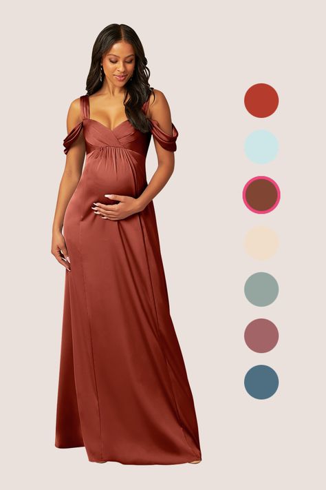 Rhea maternity bridesmaid dress is perfect for expecting mothers. Cut from stretch satin, her sweetheart neckline has pleating details and is held by shoulder straps that wrap over your shoulders and connect at the back with buttons over a keyhole detail. The empire skirt has ruching detail, letting the skirt flare beautifully with every step. Off-shoulder pleated sleeves finish this look. Terracotta Maternity Dress, Bridesmaid Dresses Pregnant, Satin Maternity Dress, Maternity Bridesmaid Dress, Pregnant Party Dress, Pregnant Bridesmaid, Beautiful Maternity Dresses, Rust Bridesmaid Dress, Plum Bridesmaid Dresses