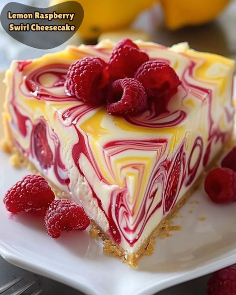 RecipesbyClareOfficial | 🍋 Luscious Lemon Raspberry Swirl Cheesecake 🍰 A show-stopping dessert with vibrant lemon and raspberry swirls for a burst of delightful... | Instagram Lemon Raspberry Swirl Cheesecake, Pretty Cheesecake, Lemon And Raspberry, Raspberry Swirl Cheesecake, Swirl Cheesecake, Raspberry Desserts, Raspberry Cheesecake, Fun Recipes, Lemon Raspberry