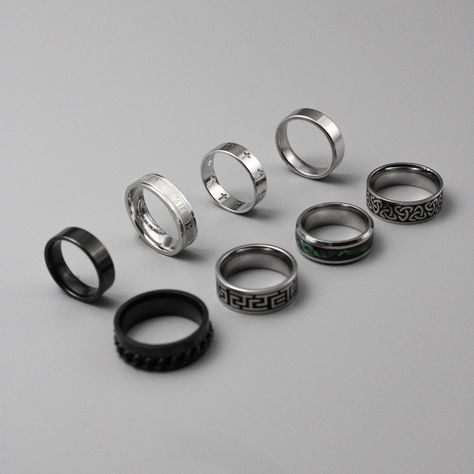 Choose from 8 of our high-quality stainless steel silver men's rings. Including: 1. Saint Cross ring 2. Celtic Knot Ring 3. Aztec Numeral Ring 4. Roman Band Ring  5. Black Classic Band Ring 6. Classic Band Ring 7.Abalone Shell Ring  8. Black Chain Ring ➤Weighty and Durable Stainless Steel ➤The perfect, versatile ring for daily wear ➤Multiple Sizes available ➤Made with High-Quality 316L Stainless Steel for a premium finish Please Note: This includes 1 ring not a full set of 8. Please pick the style that you would like from the photos. Please check our size chart in the last image before ordering. Shipping: We aim to ship your order out as soon as possible and offer Free First Class Delivery to the UK. We also offer worldwide shipping which we send with international standard delivery. Any q Minimalist Rings Men, Mens Rings Fashion Silver, Grunge Rings Men, Guys Rings Aesthetic, Tomboy Rings, Masc Rings, Rings Aesthetic Men, Men’s Rings, Rings Streetwear