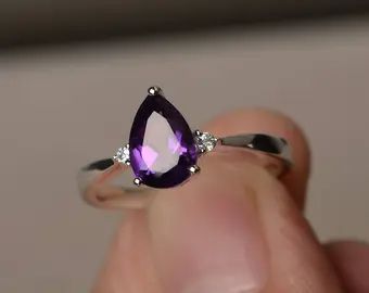 Amethyst ring white gold pear | Etsy UK Teardrop Amethyst Ring, Wedding Ring Pear, Pear Wedding Ring, September Birthstone Rings, Amethyst Ring Engagement, Green Amethyst Ring, Purple Amethyst Ring, Purple Gems, Promise Rings For Her