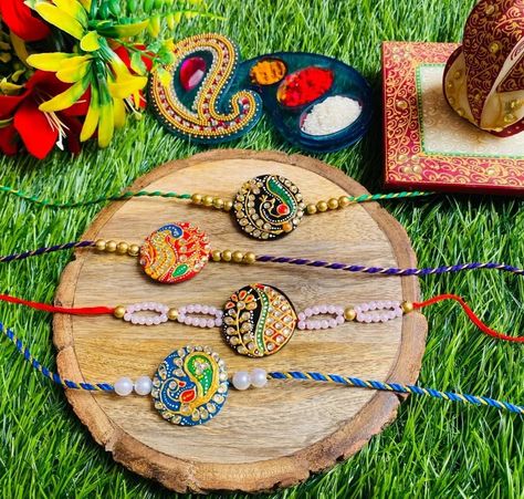 Exclusive and Customized Handmade Rakhis Available in Latest Designs.😇🧿 Stay connected for the trending and latest designs. Dm for orders or queries. #rakhi2023 #Handmaderakhi #rakshabandhan #bhai #rakhi #lamasaart #lamasarakhi #clayrakhi #reshamdoori #reelsinstagram #HobbyIdeas #handpainted #rakhihampers #rakhispecial #polymerclayrakhi Latest Rakhi Designs Handmade, Rakhi Designs Handmade, Handmade Rakhi Designs, Rakhi Making, Handmade Rakhi, Rakhi Design, Raksha Bandhan, Stay Connected, Latest Design