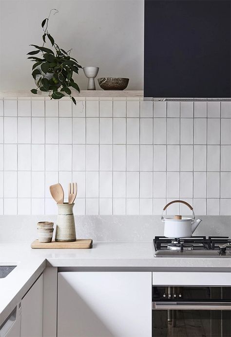 Kitchen backsplash with vertical stacking bond subway tile (via Bicker) Scandinavian Kitchen Tiles Wall, Bicker Design, Dapur Skandinavia, White And Grey Kitchen, Style Curator, Countertop Inspiration, Subway Tile Patterns, White Kitchen Splashback, Kitchen Splashback Tiles