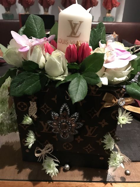 Louis Vuitton flower arrangement for birthday Birthday Bouquet, Flower Arrangement, Ariel, Flowers Bouquet, Flower Arrangements, Boston, Violet, Gift Wrapping, Louis Vuitton