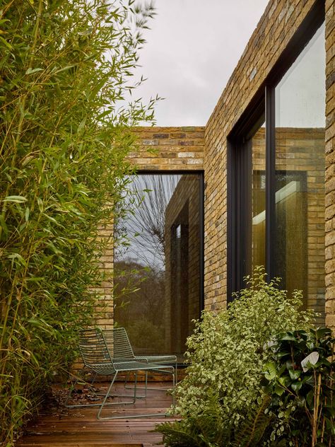 Coffey Architects sets small brick home atop Victorian prison vaults in London London Brick Wall, Brick Garden Wall, Brick Plinth Architecture, Coffey Architects, Reclaimed Brick Wall, Victorian Prison, Brick Collonade Architecture, Joliet Prison, Grand Designs Houses