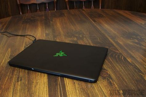 Razer Blade review (14-inch) - The Verge Razer Laptop, Gaming Laptop Setup, Razer Blade, Architecture Ideas, Cupboard Design, Green Logo, Racing Stripes, The Verge, Retina Display