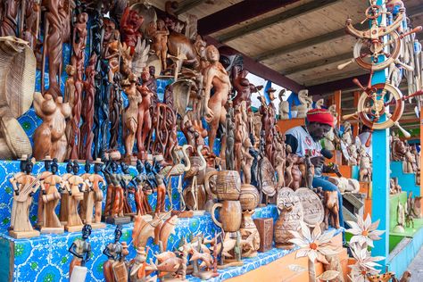 Woodworking in Nassau, Bahamas; Courtesy of pablopicasso/Shutterstock.com Straw Market Nassau Bahamas, Dream Trips, Nassau Bahamas, What To Buy, Nassau, Traditional Crafts, Travel Poster, Bahamas, Travel Dreams