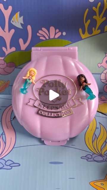 Chronic Pocket on Instagram: "Mattel Polly Pocket Keepsake Collection Mermaid Dreams 🐚  Before Mermay ends, I wanted to post my favourite compact from the Mattel remakes. I madly love the illustrations on the packaging and the holographic inside!  The dolls are just everything! I can't stand 💀  #pollypocket #pollypockets #keepsake #keepsakecollection #pollypocketkeepsakecollection #mermay #mermaid #dolls" Polly Pocket Keepsake Collection, Polly Pocket Cross Stitch, Polly Pocket Compact, Polly Pocket Dolls, Mermaid Dreams, Mermaid Dolls, Toy Collector, Polly Pocket, 90s Kids