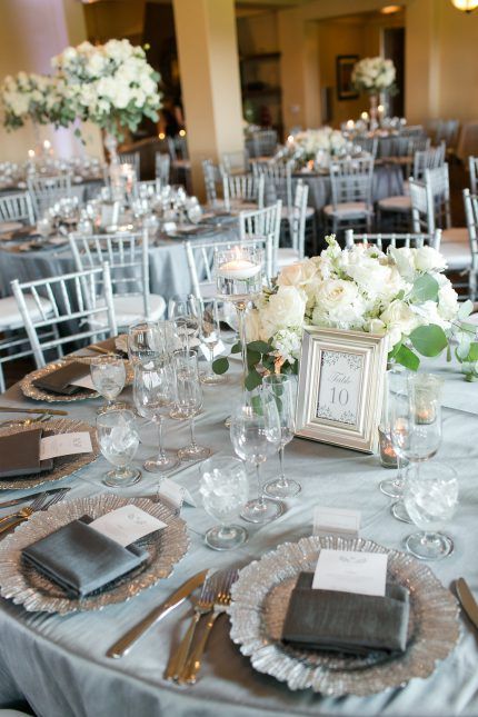 Silver and white table number and reception decor.  Timeless Monogram Wedding Stationery Collection | Agape Planning Elegant White And Silver Table Decor, Silver Table Setting Wedding, White Silver And Gold Wedding, Silver Wedding Decor, Grey Inspiration, Gray Theme, Rustic Modern Wedding, Rustic Wedding Venues, Wedding Congratulations