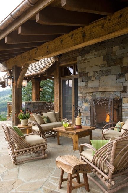 covered patio Rustic Patio, Rustic Porch, Casa Country, Porch Furniture, Outside Living, Cabin In The Woods, Patio Stones, Cabins In The Woods, Outdoor Fireplace