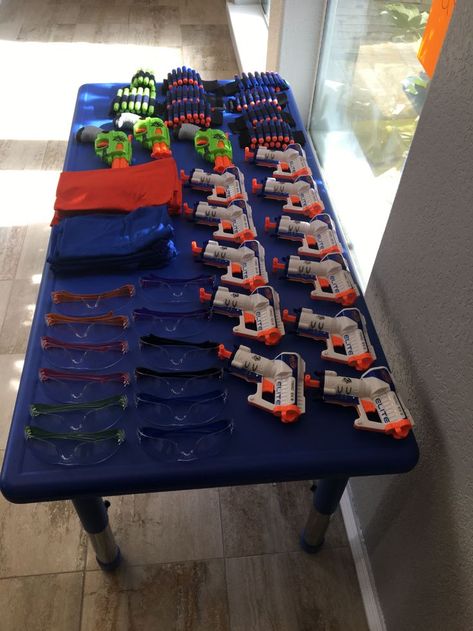 Nerf Party Dart Wars Birthday Party, Fornite Food Ideas, Indoor Nerf Party, Backyard Nerf Battlefield, Glow In The Dark Nerf Party, Nerf Wars Battlefield Diy, Nerf Wars Battlefield, Nerf Party Games, Nerf Birthday Party Ideas Food