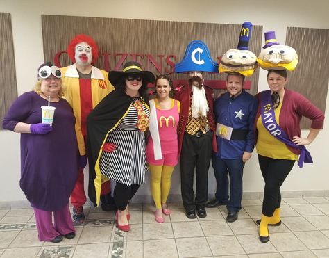 Mayor McCheese, Officer Big Mac, Captain Crook, Birdie, Hamburglar, Ronald McDonald, Grimace - DIY  - Coworkers Mcdonalds Group Costume, Mcdonalds Costume Ideas, Mayor Mccheese Costume, Mcdonald's Characters Costumes, Diy Grimace Costume, Grimace Costume Diy, Mcdonald’s Halloween Costumes, Grimace Halloween Costume, Mcdonalds Halloween Costumes