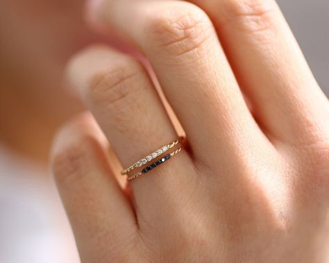 "Black Spinel Ring, Rose Gold Ring, Promise Ring, Dainty Ring, Minimalist Ring, Rose Gold Band, Stackable Ring, Vintage Ring, Rose Gold The finish on the metal is in 925 sterling silver. Weight Total weight of Ring: 4.2 grams Total weight of Silver: 4.1 grams Band Width - 1.3 mm Materials Used Spinel, Silver & Silver Shipping It's free. We have partnered with some of the fastest & most reliable logistics companies to keep the delivery process smooth. More Products See more jewelry on our shop pa Black Diamond Wedding Bands, Black Spinel Ring, Micro Pave Ring, Twisted Band Ring, Ring Rosegold, Twisted Band, Black Diamond Ring, Band Engagement Ring, Diamond Wedding Band