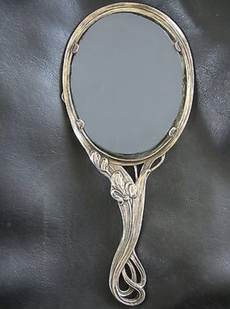 Art Nouveau WMF Silver over Pewter Hand Mirror with Irises c.1906  (side 2) Art Nouveau Hand Mirror, Hand Mirrors, Random Objects, Art Deco Vanity, Aquarius Season, Hand Mirror, Irises, Mirror Mirror, 3d Modeling