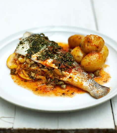 stuffed sea bass | Jamie Oliver | Food | Jamie Oliver (UK) #Seafood Visit: http://explodingtastebuds.com/ Sea Bass Recipes, Jamie Oliver Recipes, Steamed Vegetables, Greek Food, Sea Bass, Sea Food, Baked Salmon, Jamie Oliver, Side Salad