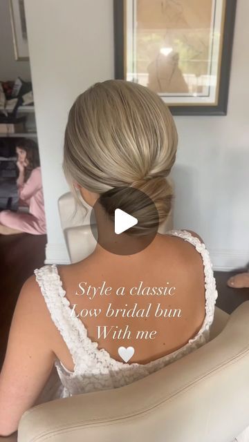 Kristen Okaly on Instagram: "Danielle 🤍 classic low buns always 🫶🏻 Mua @byalyssaa  . @sexyhair powder play . #bridalbun #updotutorial #njbridalhair #njhairstylist #updoeducator #njbride #brideinspiration #weddingreels #bridereels #parkchateauwedding #bridalhairstyle #classicbridalhair #bridalhairideas #njweddings #updoideas #bridetobe2025" Wedding Low Bun Hairstyles How To, Low Messy Bun Front View, Low Bun Wedding Hair Step By Step, Bridal Hair Low Bun Blonde, Bridal Buns Low, Simple Hair Up Do, Low Chignon Bun Wedding, Low Hairstyles Wedding, Low Bun With Front Pieces Curled