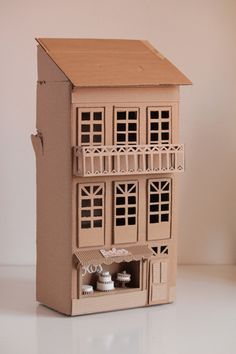 Cardboard Storefront Ideas, Building Made Out Of Cardboard, Cardboard Town Diy, Building With Cardboard, Cardboard Builds, Cardboard Bakery, Dollhouse Made Of Cardboard, Cardboard House Sculpture, Cardboard Architecture